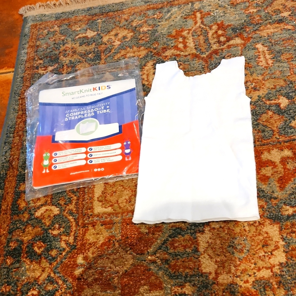 2 SmartknitKIDS compression strapless tube shirts.